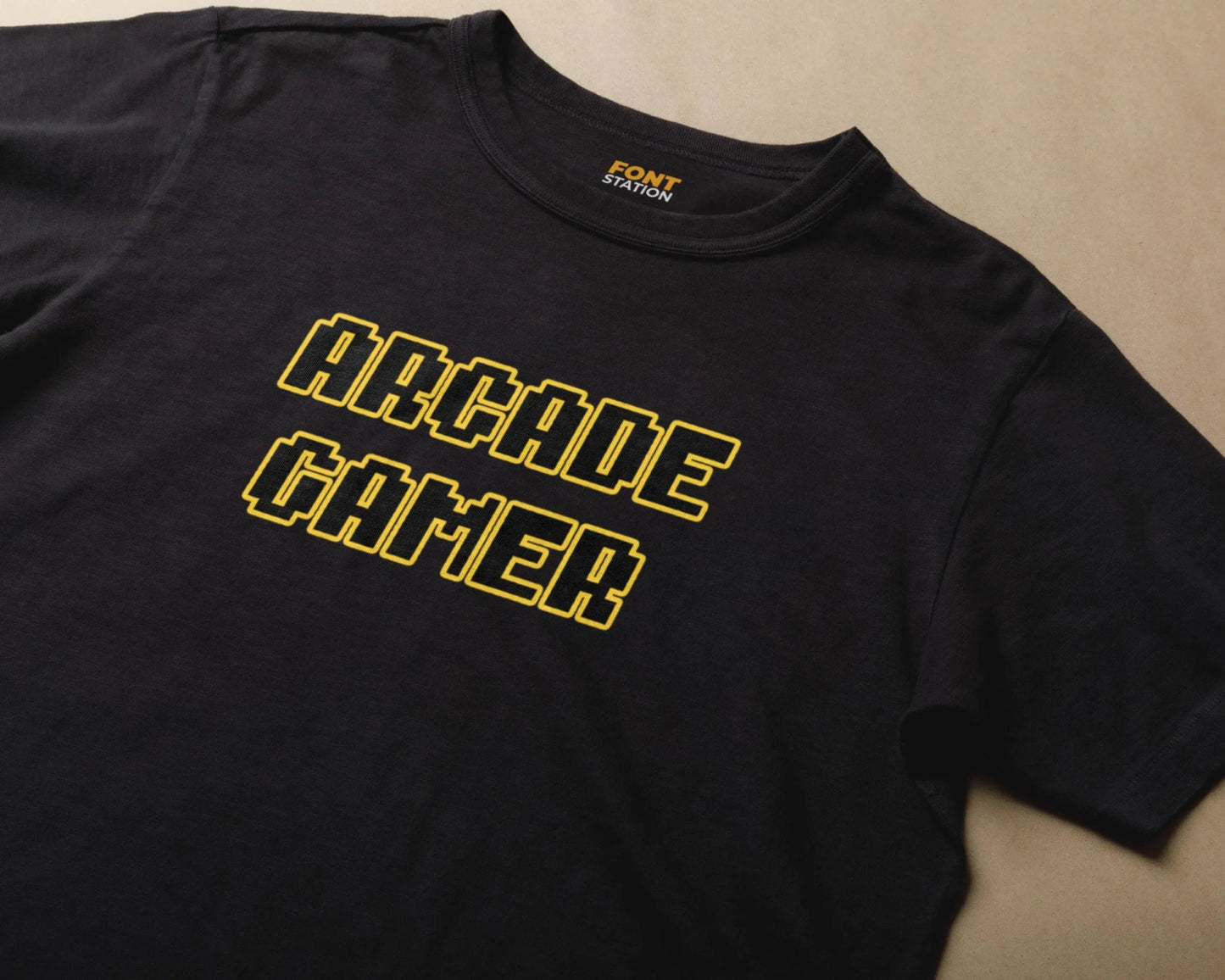 Sublimated T-Shirt with Arcade Gaming Font Typography - Fashionable Apparel Displaying Stylish Lettering