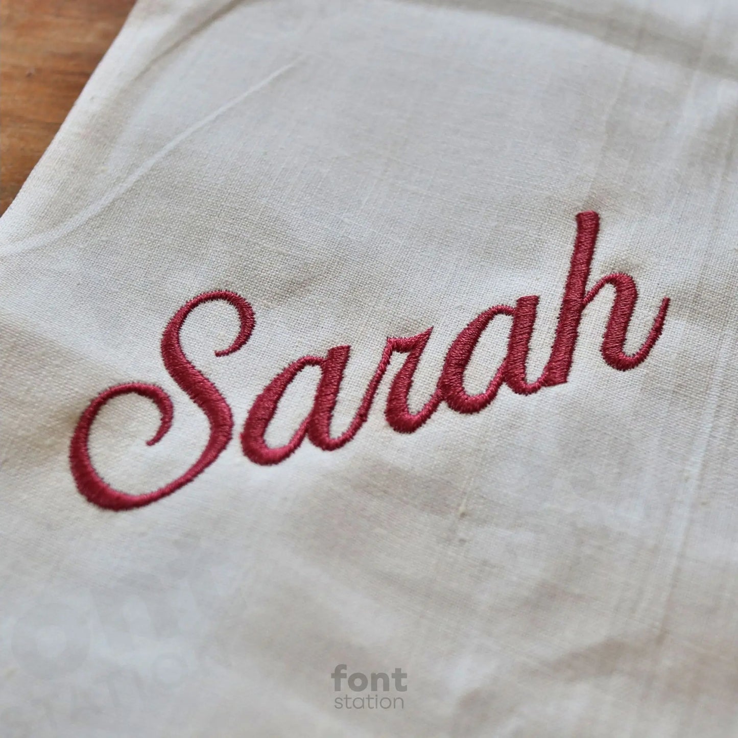 Embroidered letters using the Ballantines embroidery font created by FontStation