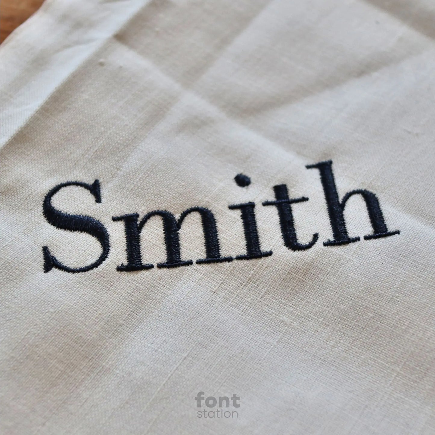 Embroidered letters using the Bodoni embroidery font created by FontStation