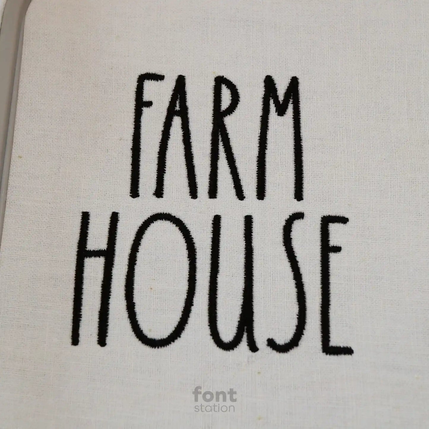 Embroidered letters using the Farmhouse embroidery font created by FontStation