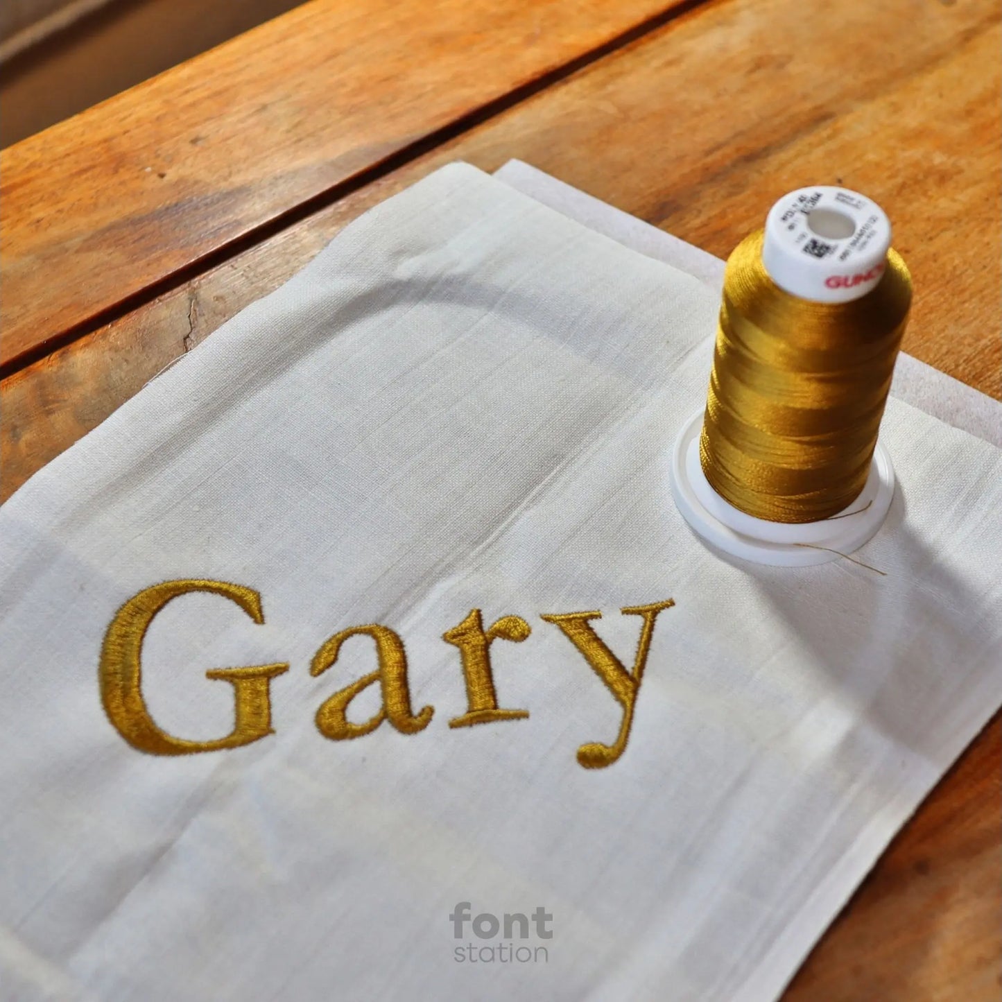 Embroidered letters using the Garamond embroidery font created by FontStation