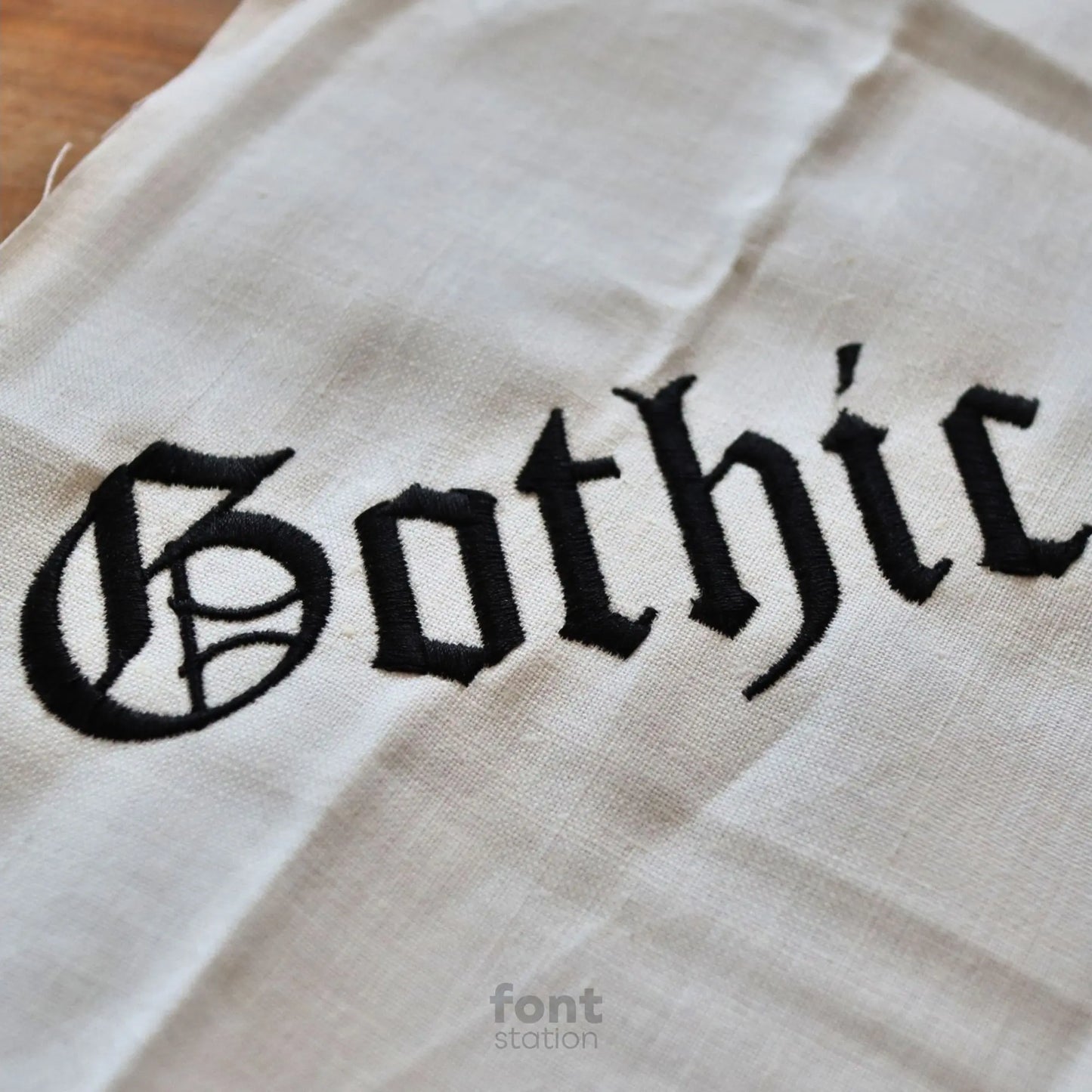 Embroidered letters using the Old English embroidery font created by FontStation