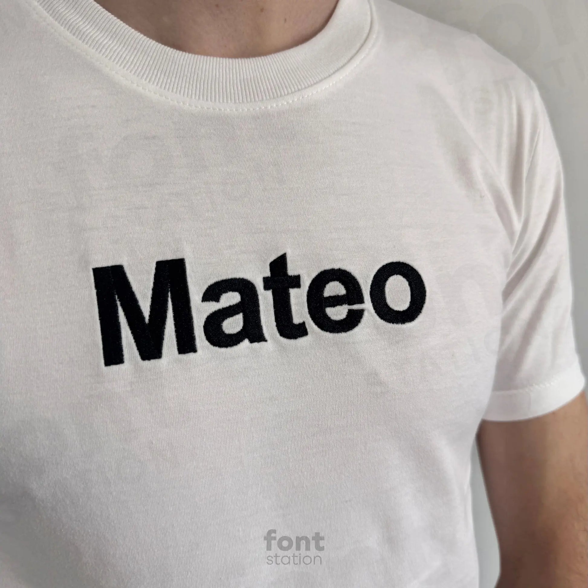 Image showing a word embroidered on textile using the Arial Bold embroidery font created by FontStation