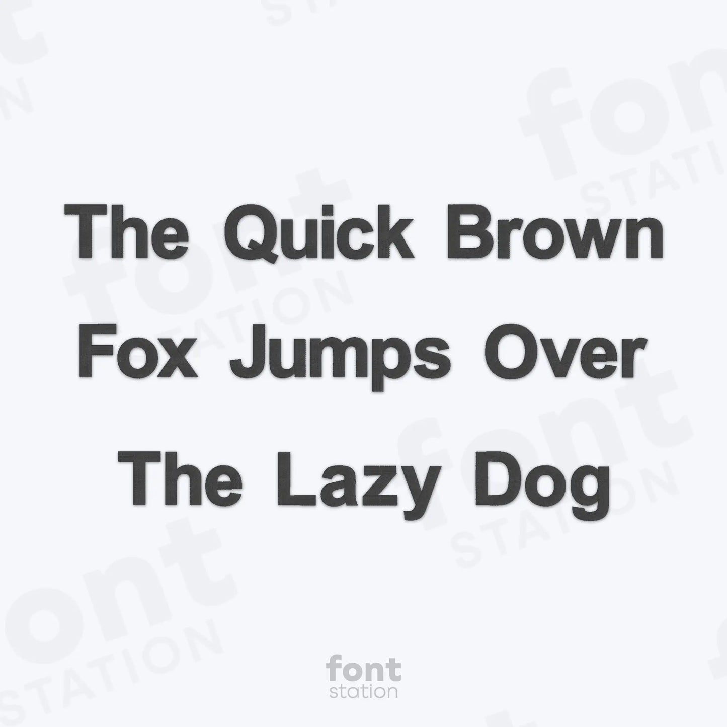 Text 'The Quick Brown Fox Jumps Over The Lazy Dog' on a white background using the Arial Bold embroidery font