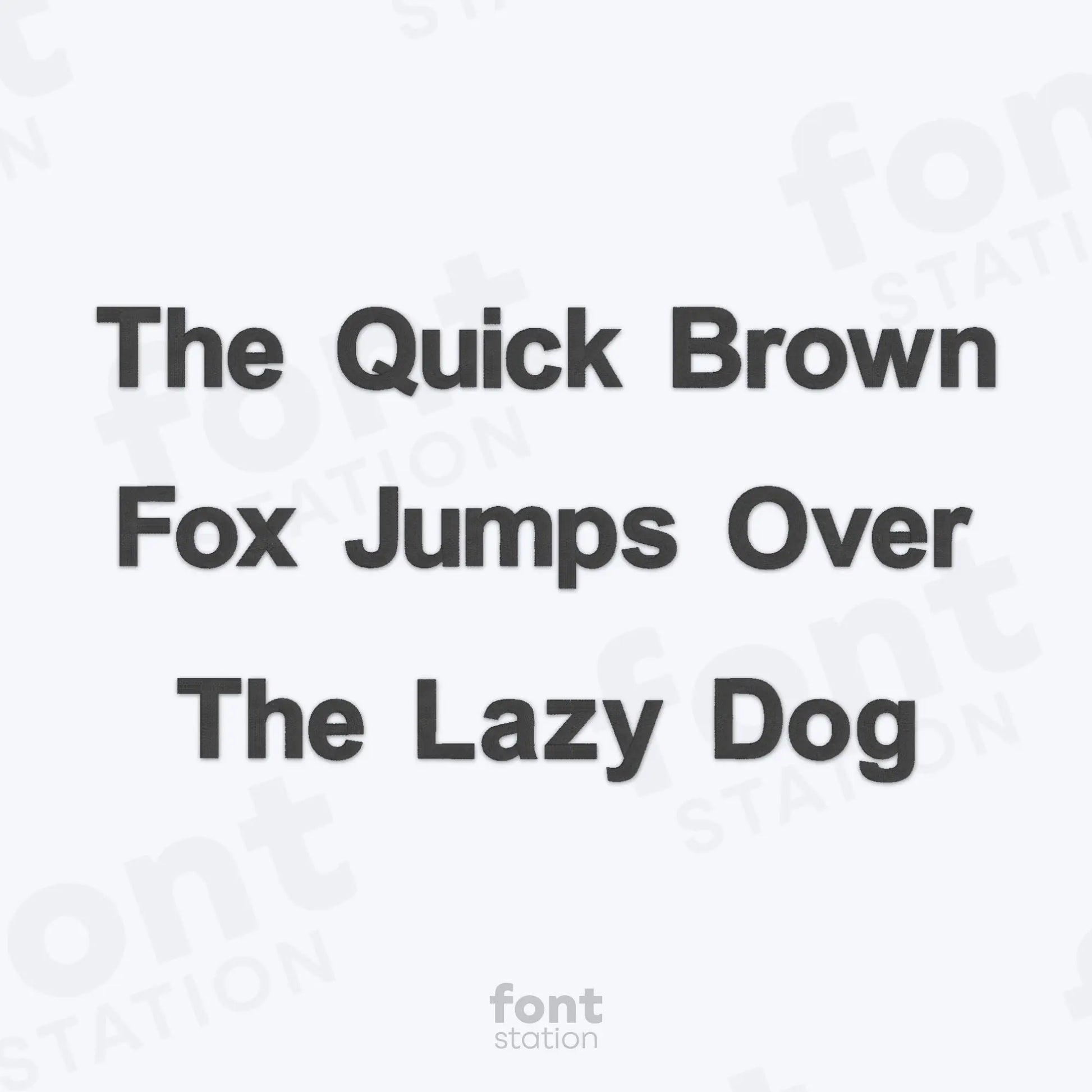 Text 'The Quick Brown Fox Jumps Over The Lazy Dog' on a white background using the Arial Bold embroidery font