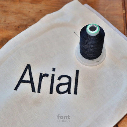 Image showing a word embroidered on textile using the Arial Narrow embroidery font created by FontStation