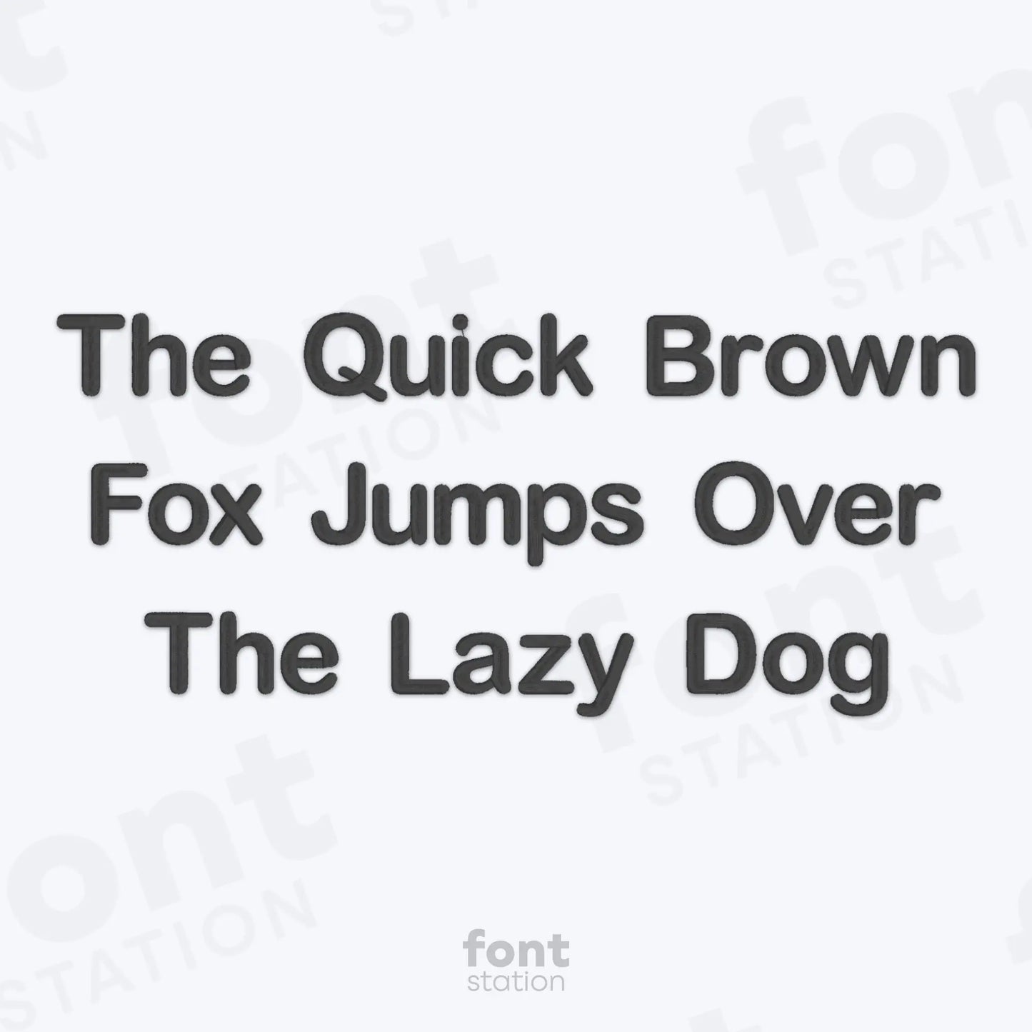 Text 'The Quick Brown Fox Jumps Over The Lazy Dog' on a white background using the Arial Rounded embroidery font by FontStation.