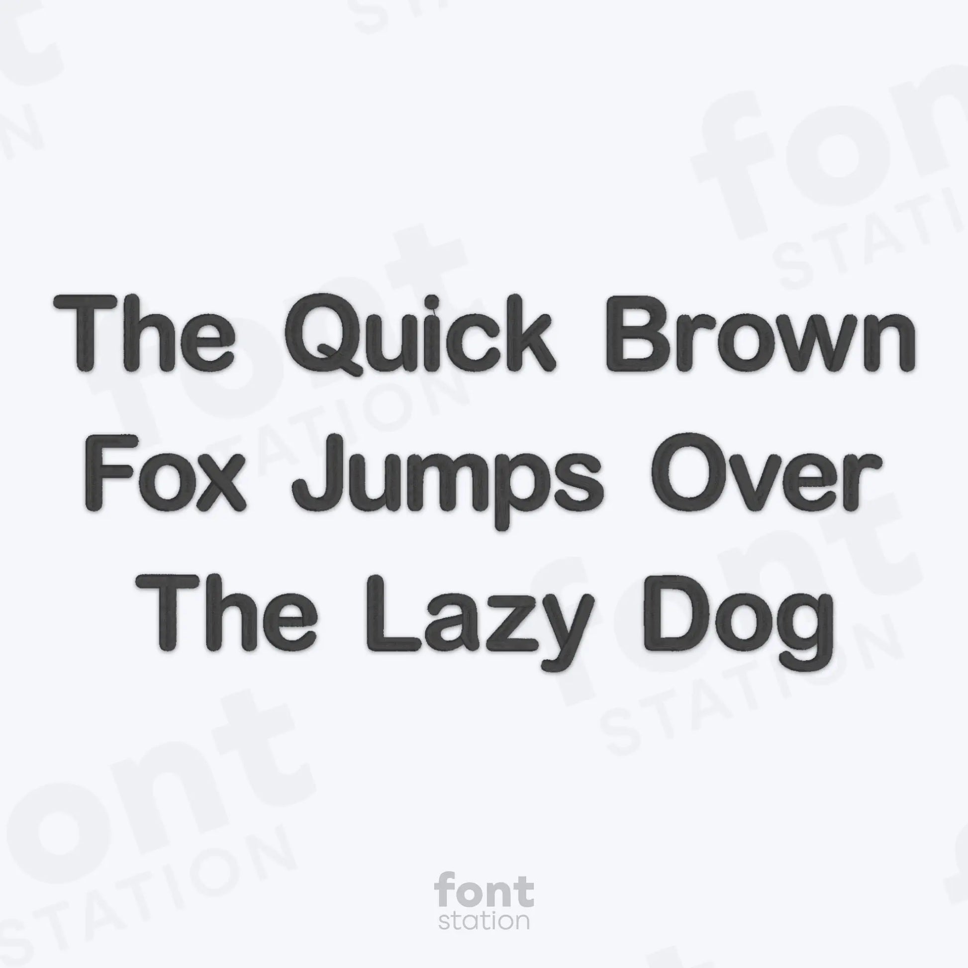 Text 'The Quick Brown Fox Jumps Over The Lazy Dog' on a white background using the Arial Rounded embroidery font by FontStation.