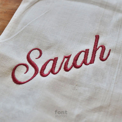 Embroidered letters using the Ballantines embroidery font created by FontStation