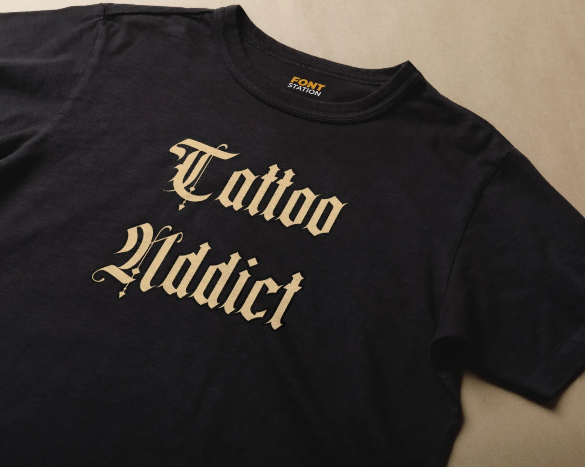 Sublimated T-Shirt with Black Inked Studio Font Typography - Fashionable Apparel Displaying Stylish Lettering