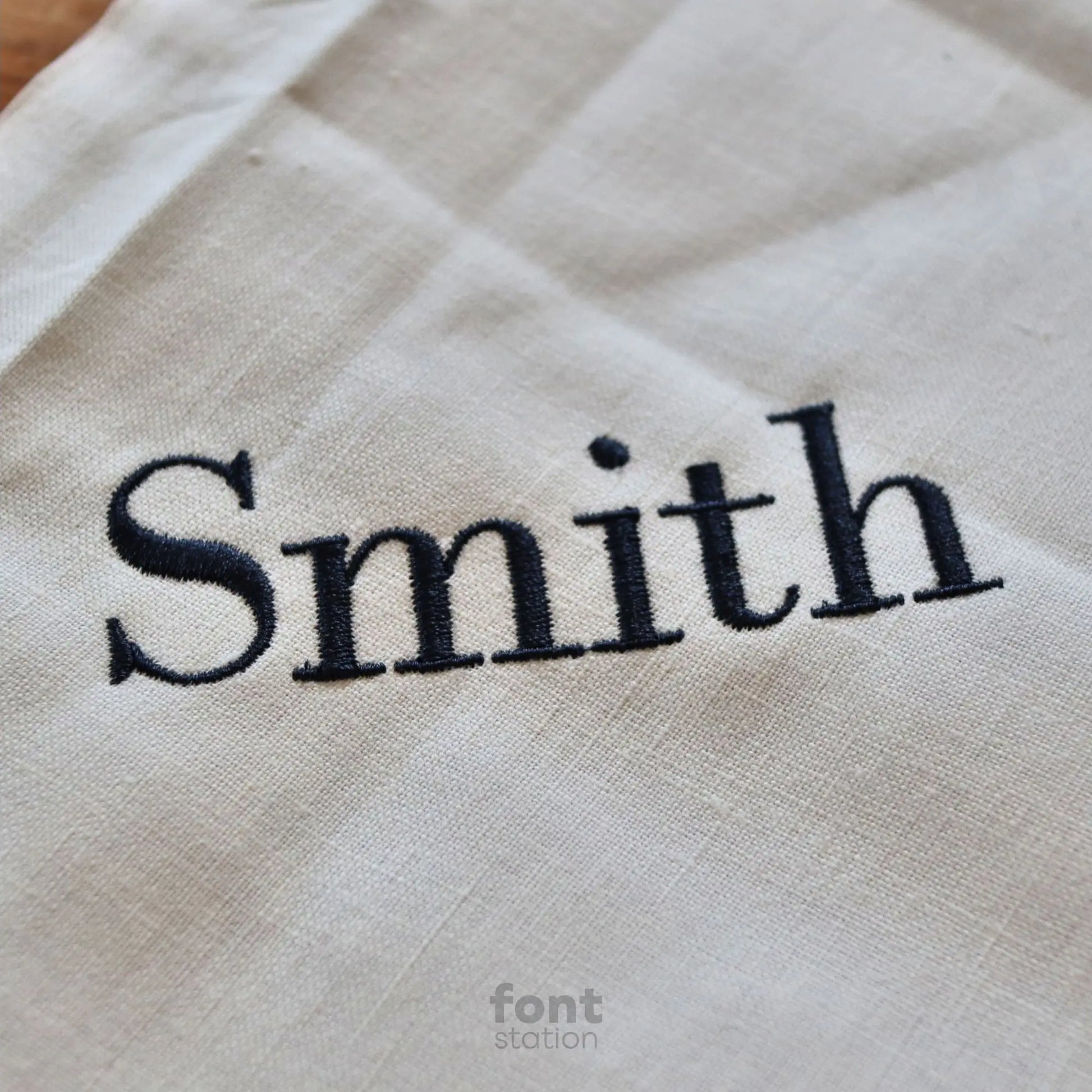 Embroidered letters using the Bodoni embroidery font created by FontStation