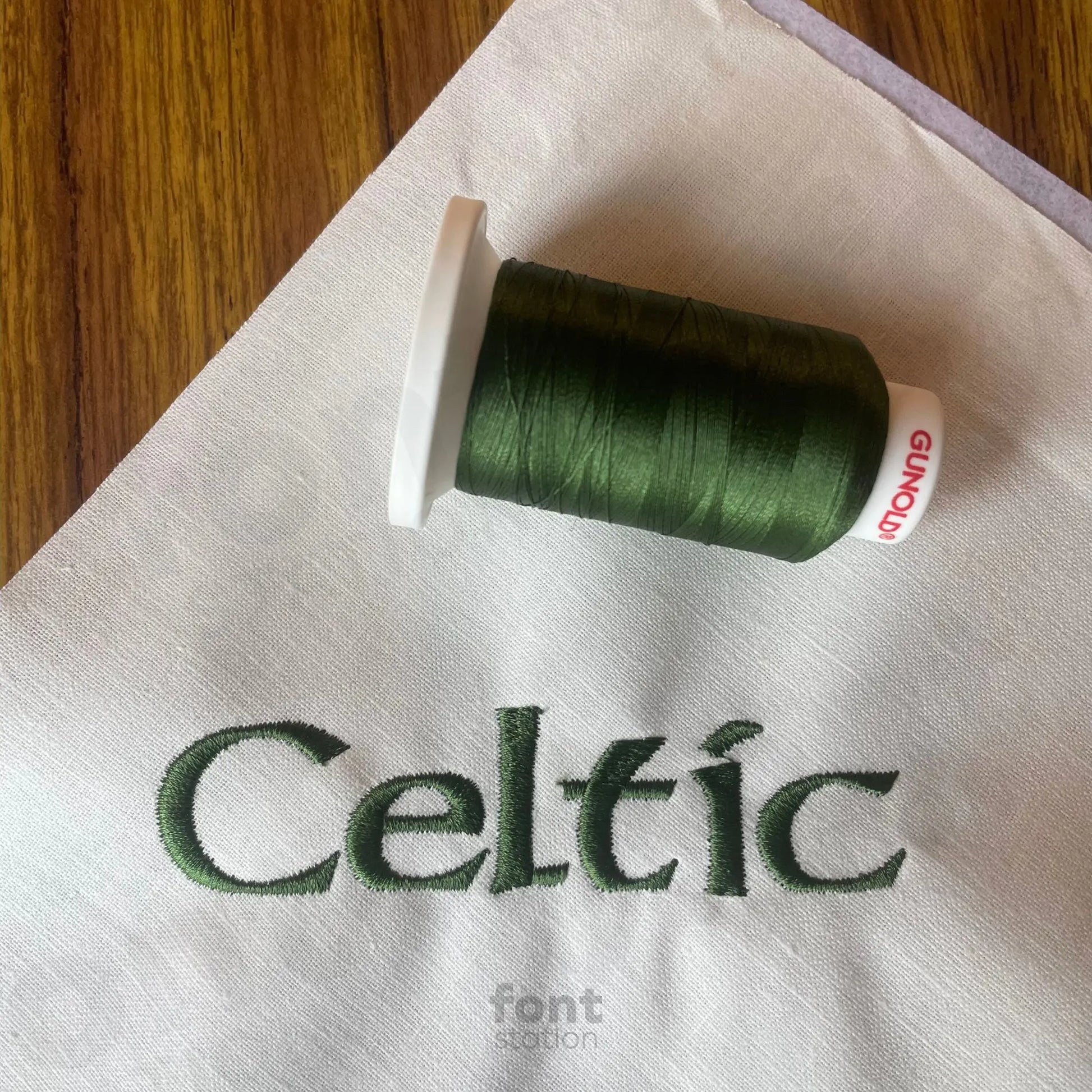 Image showing a word embroidered on textile using the Celtic embroidery font created by FontStation