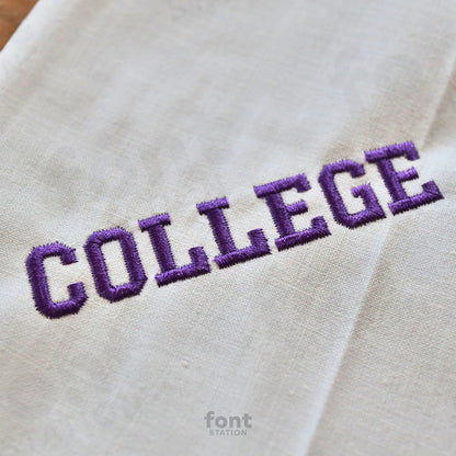 Image showing a word embroidered on textile using the College embroidery font created by FontStation