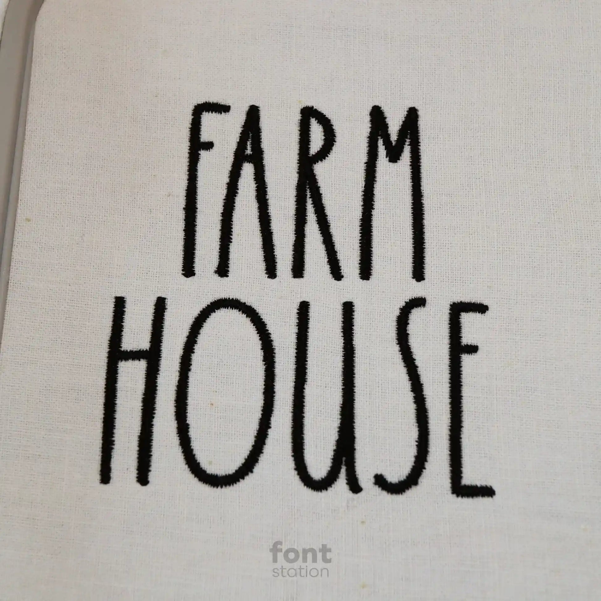Embroidered letters using the Farmhouse embroidery font created by FontStation