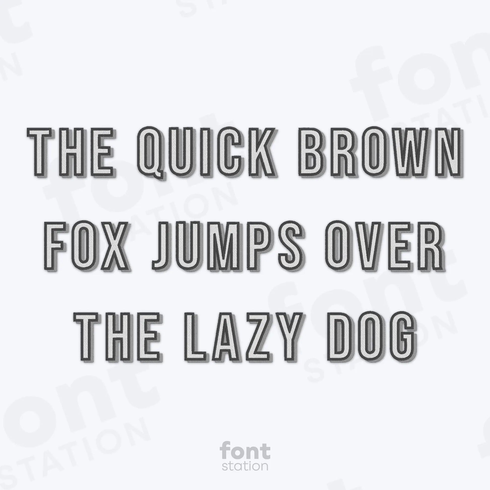 Text 'The quick brown fox jumps over the lazy dog' on a white background using the Shadow Block embroidery font by FontStation
