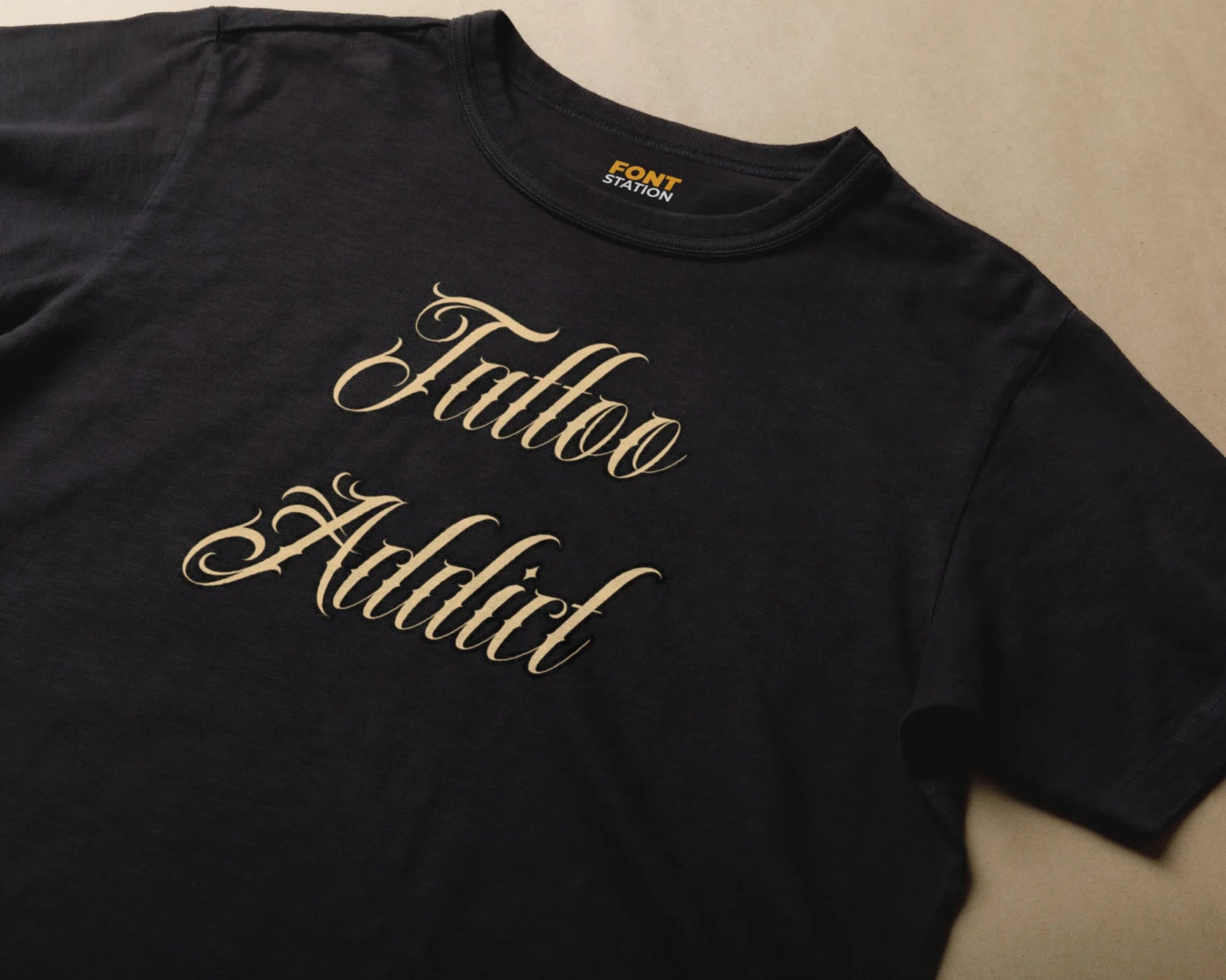 Sublimated T-Shirt with Tattoo Shop Font Typography - Fashionable Apparel Displaying Stylish Lettering