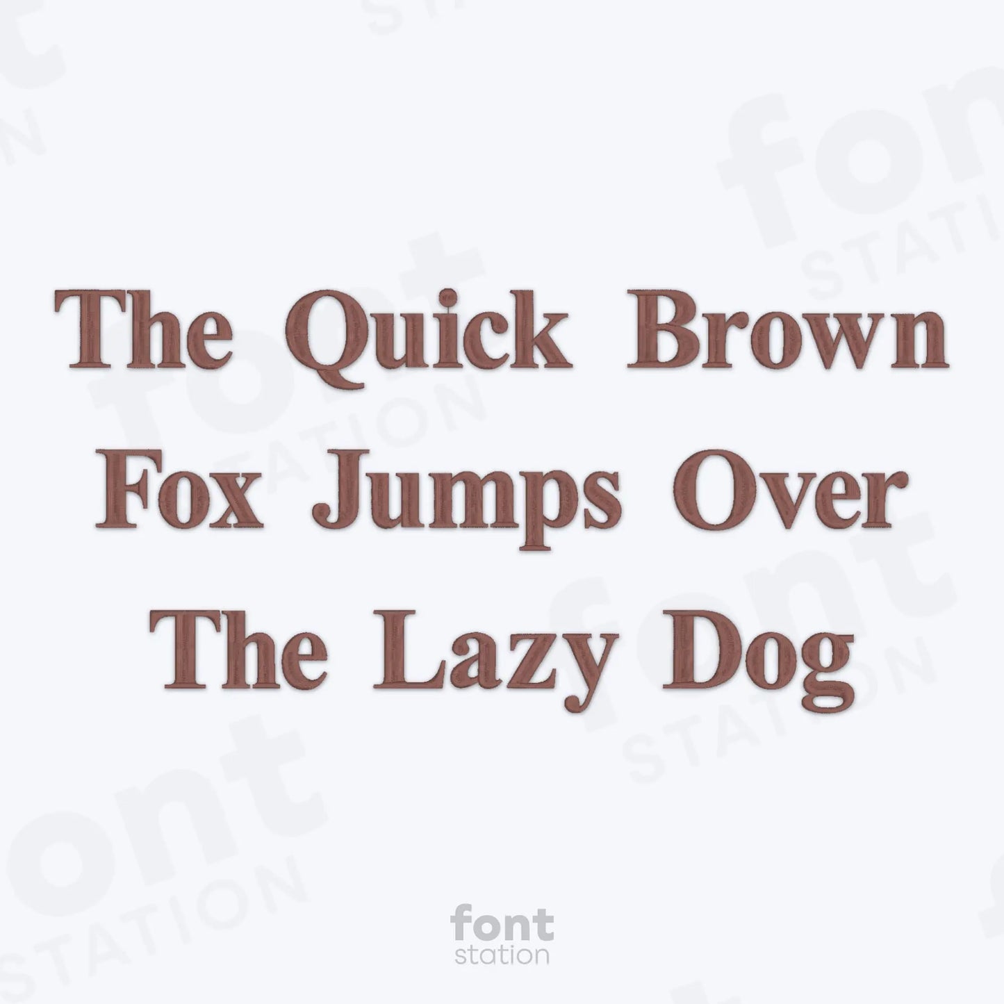 Text 'The Quick Brown Fox Jumps Over The Lazy Dog' using the Times Roman Bold embroidery font on a white background.
