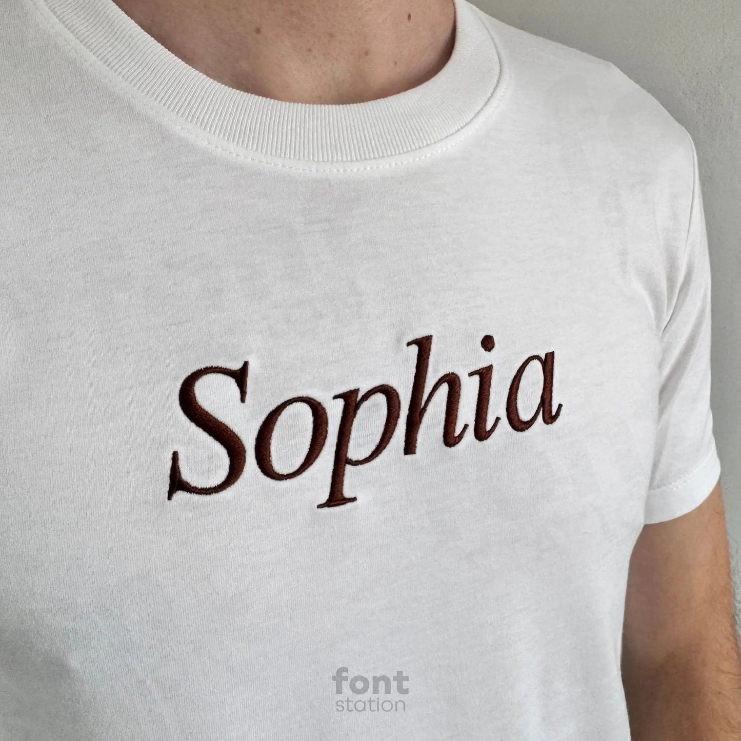 Image showing a word embroidered on textile using the Times Roman Italic embroidery font created by FontStation